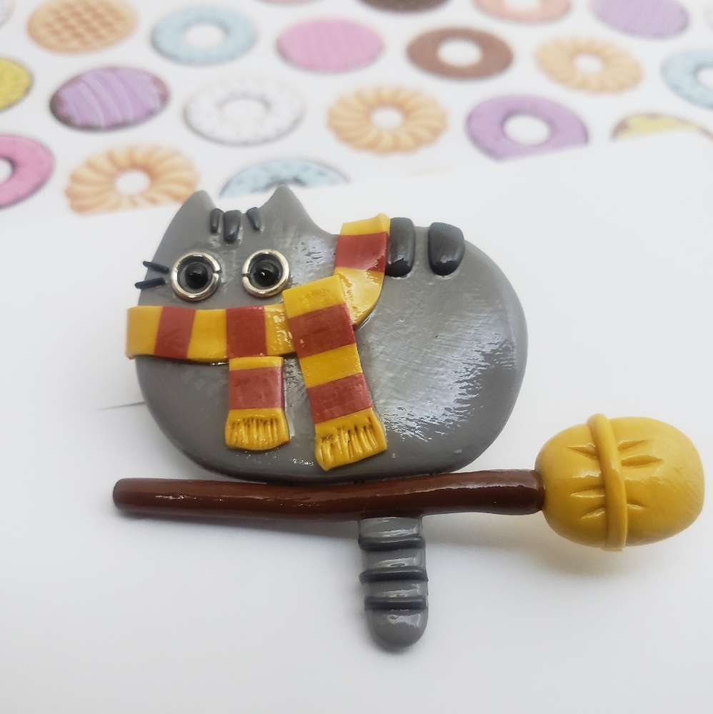 Cat on broom brooch. Handmade, brand new